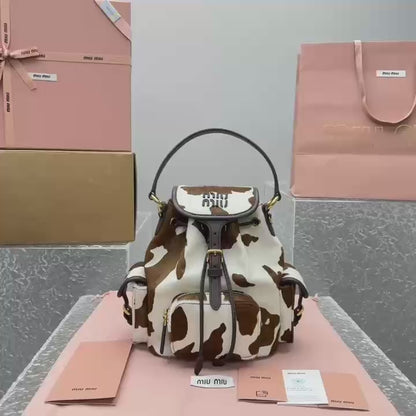 카타 / 미우미우 신형 젖소 무늬 백팩