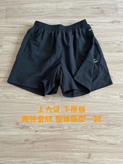 사탄 / 발렌시아가 나일론 루즈핏 쇼츠
