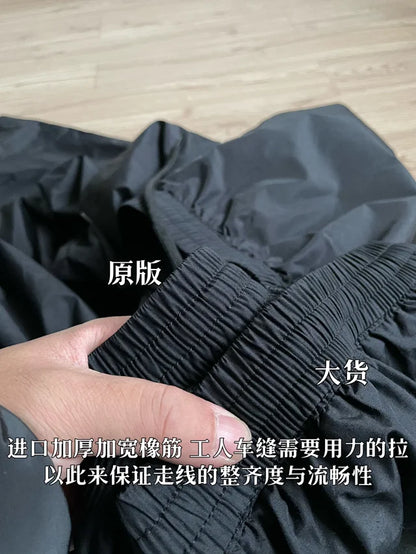 사탄 / 발렌시아가 루즈핏 트레이닝 팬츠