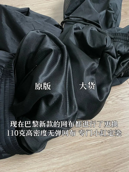 사탄 / 발렌시아가 루즈핏 트레이닝 팬츠