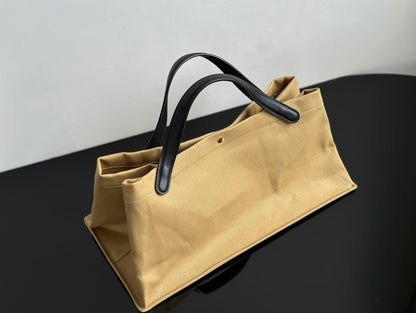 Two factories / The Row canvas bag