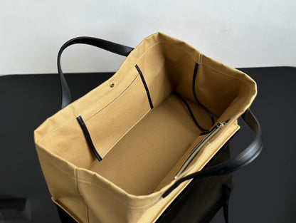 Two factories / The Row canvas bag