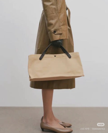 Two factories / The Row canvas bag