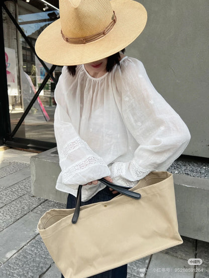 Two factories / The Row canvas bag