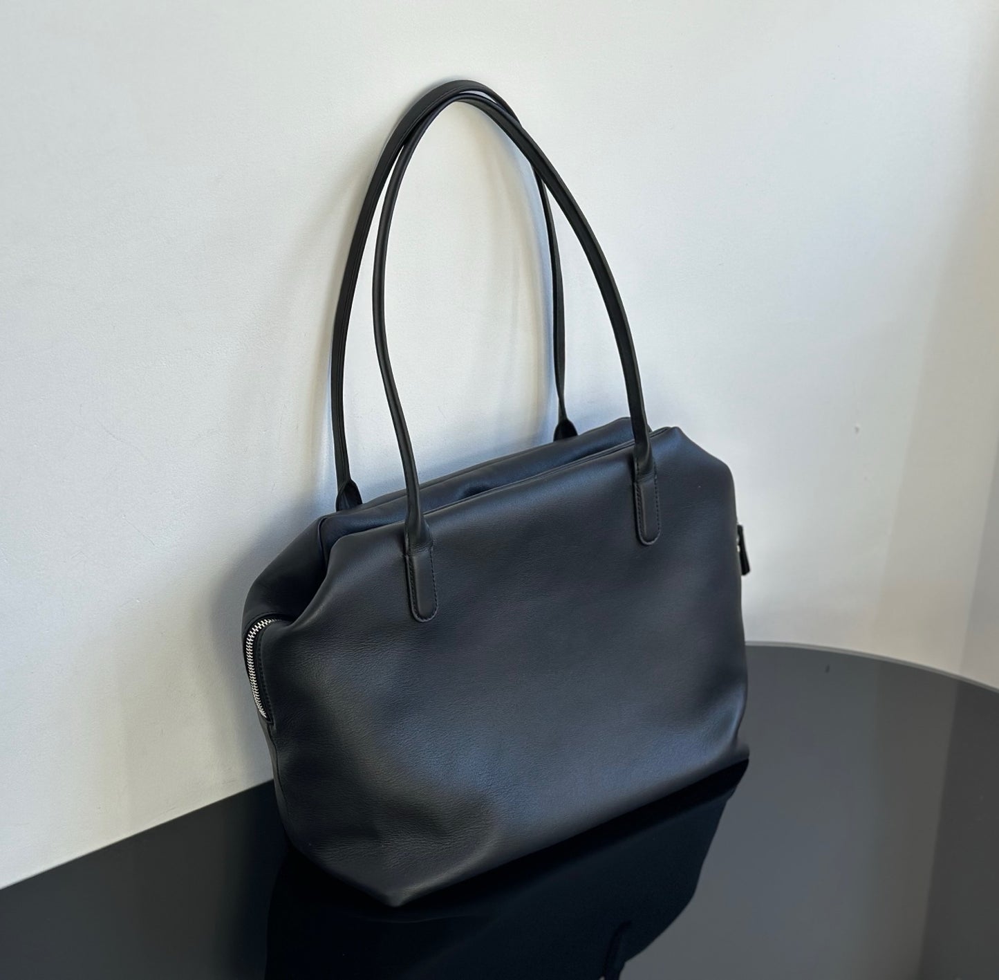Both factories / The Row handbags