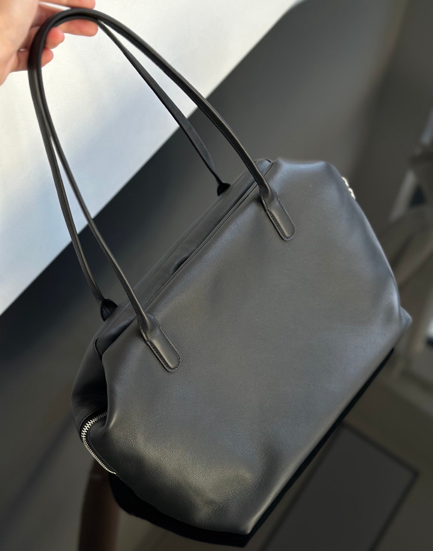 Both factories / The Row handbags