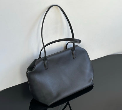 Both factories / The Row handbags