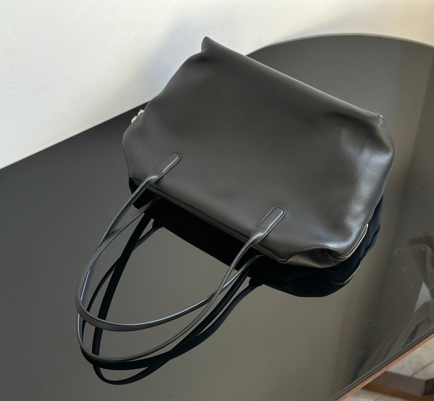 Both factories / The Row handbags