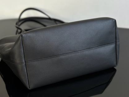 Both factories / The Row handbags
