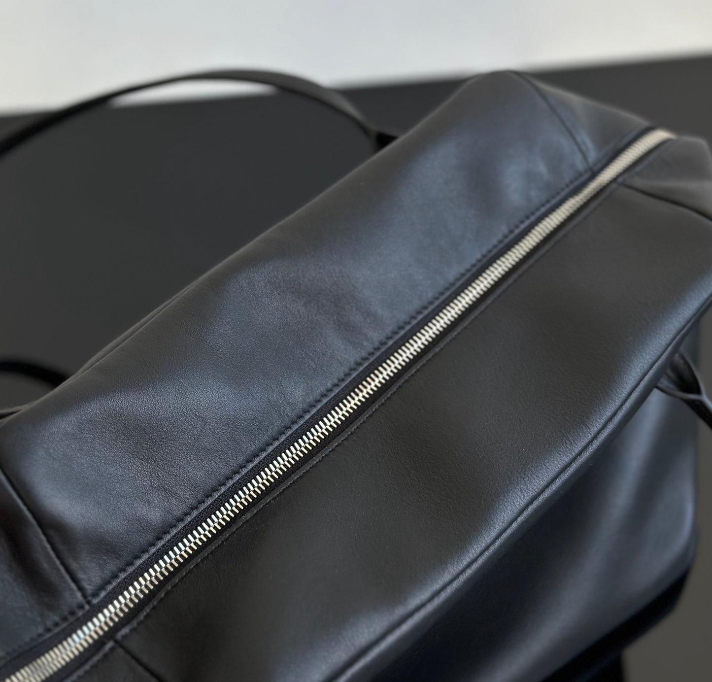 Both factories / The Row handbags