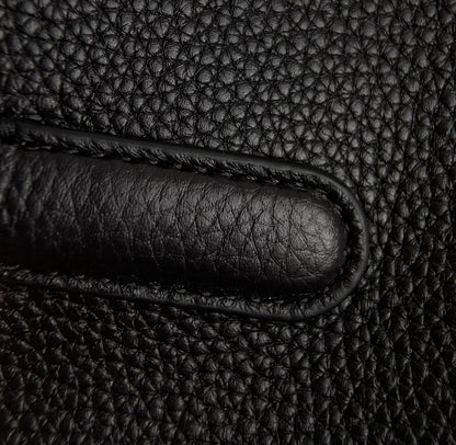 Both factories / The Row handbags