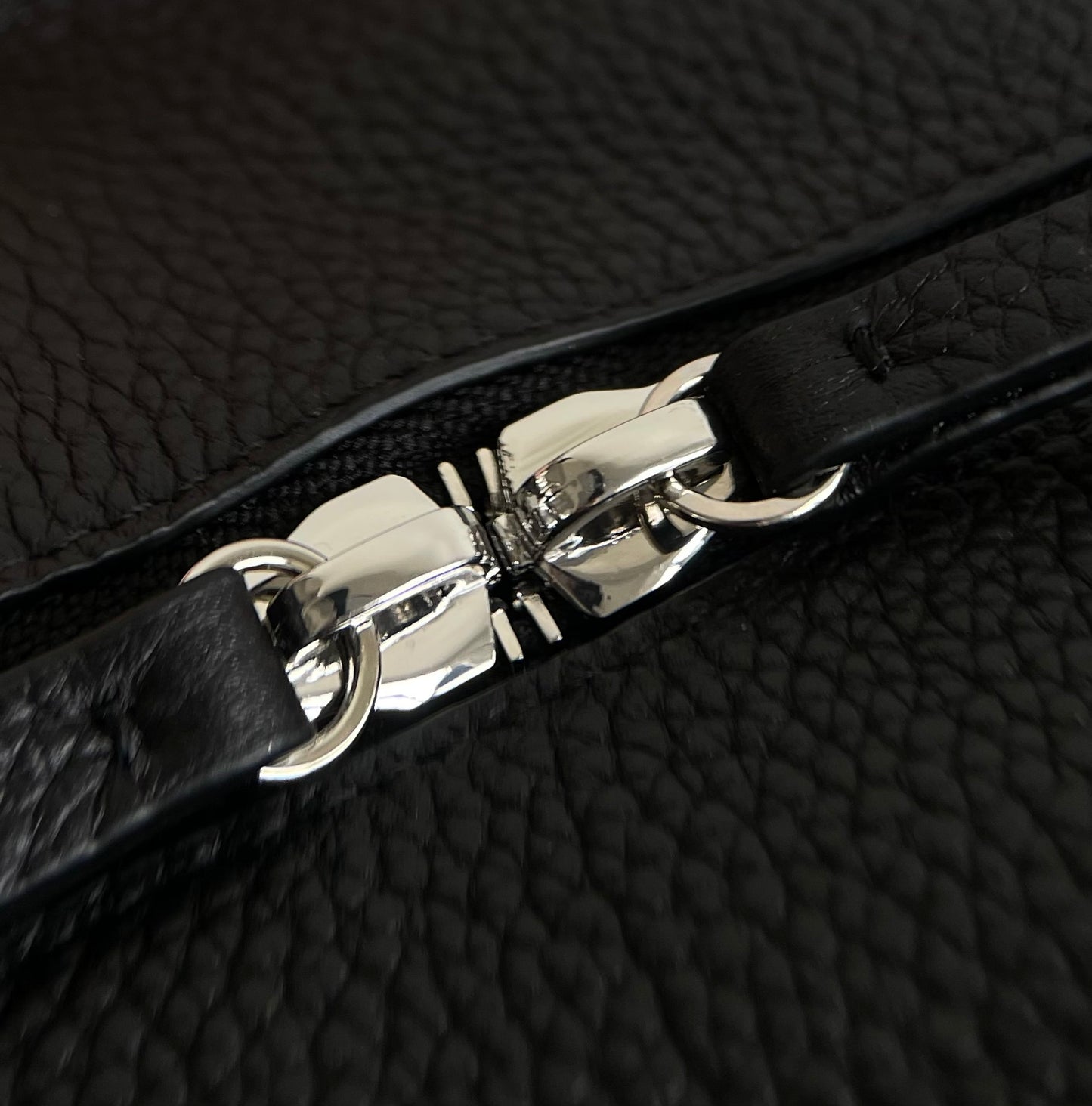 Both factories / The Row handbags
