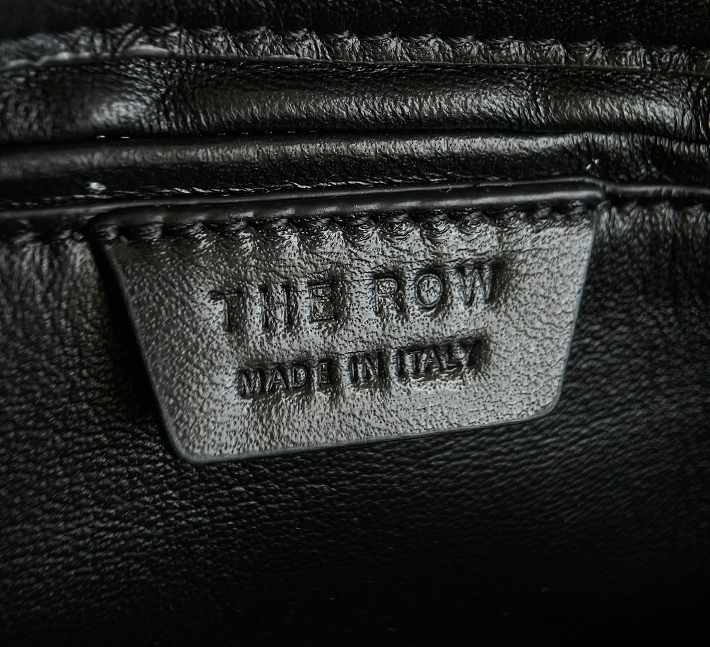 Both factories / The Row handbags