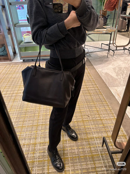 Both factories / The Row handbags