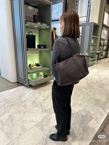 Both factories / The Row handbags