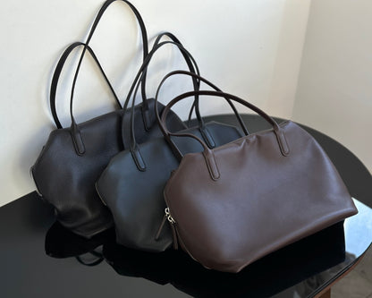 Both factories / The Row handbags