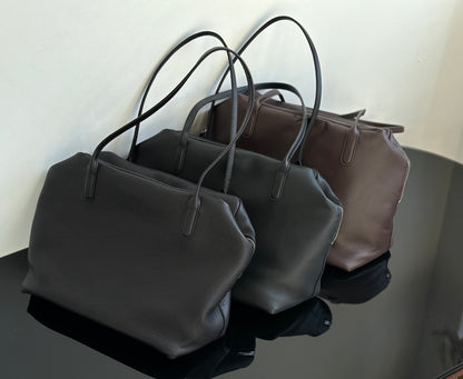 Both factories / The Row handbags