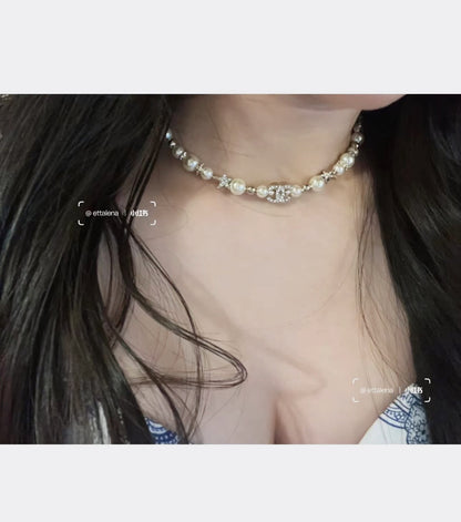 Boss accessories / Chanel pearl necklace