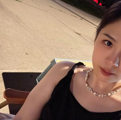 Boss accessories / Chanel pearl necklace