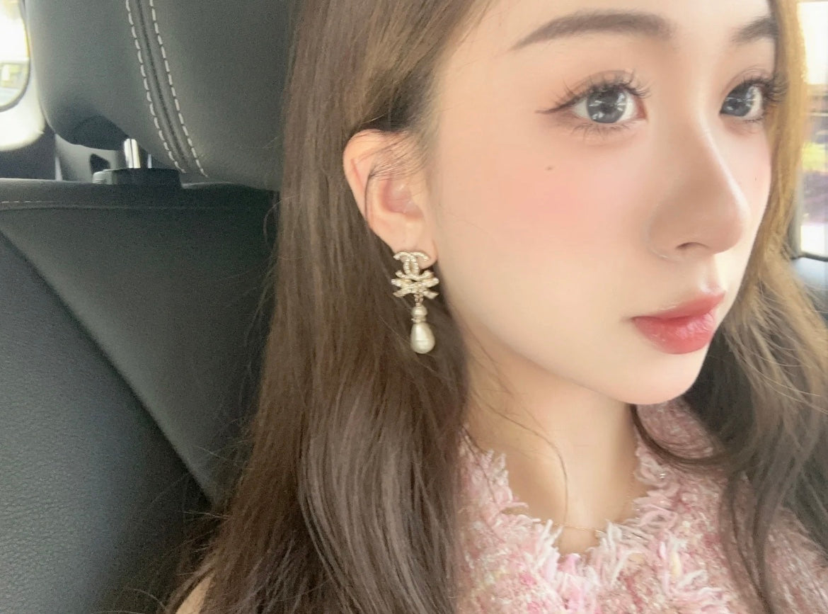 보스 악세사리 / 샤넬 여성 리본 귀걸이