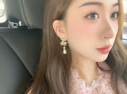 보스 악세사리 / 샤넬 여성 리본 귀걸이
