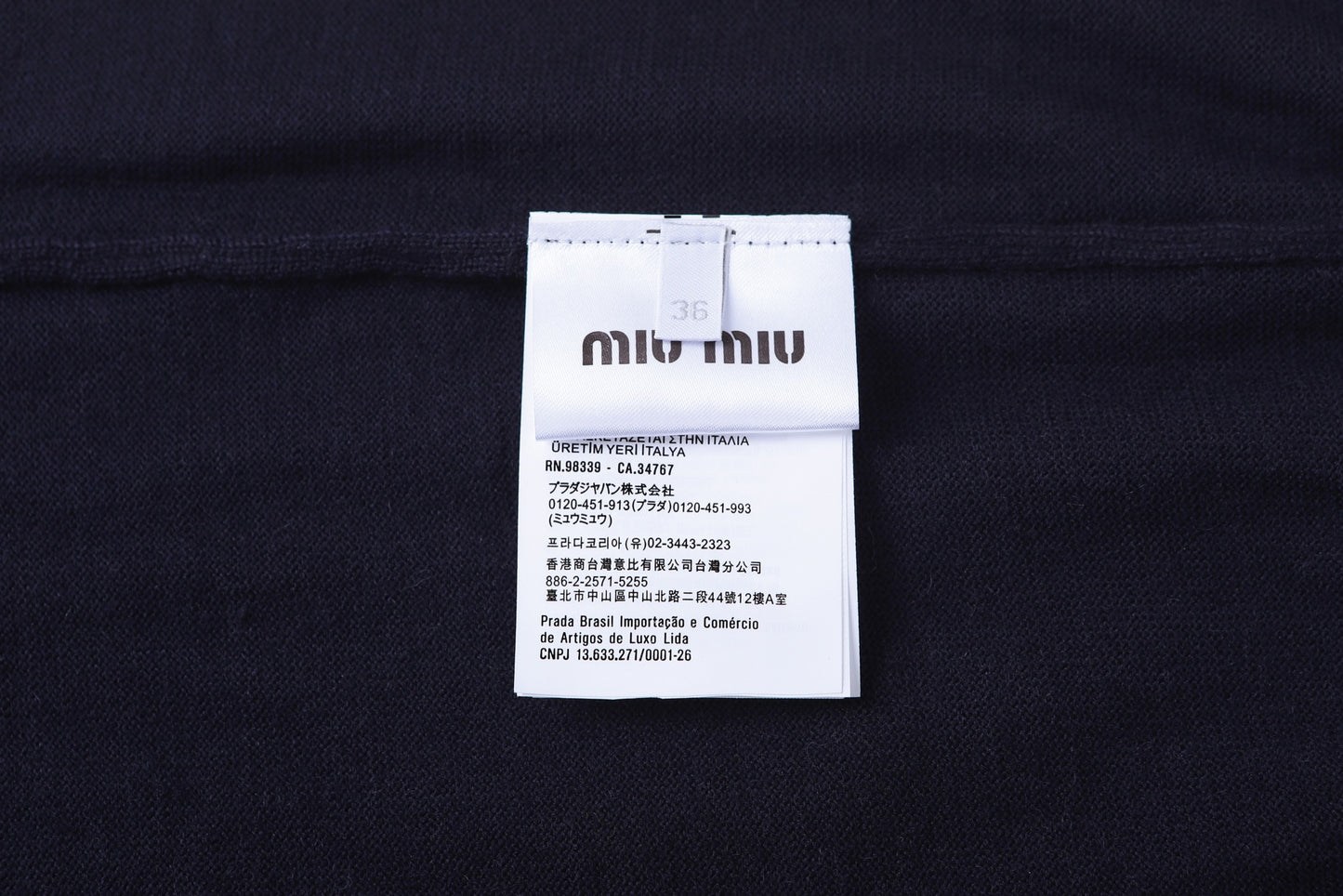 ZZLL / 미우미우 반집업 스웨터