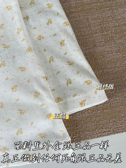 티모 / 미우미우 노랑 플라워 프린트 반팔