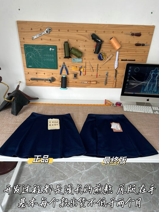 Timo / Miu Miu pleated compressed logo blue mini skirt