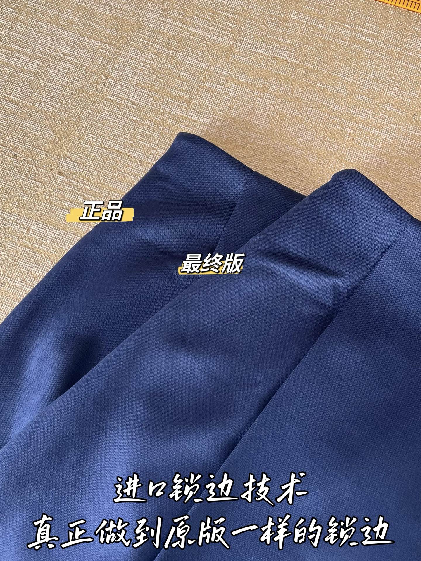 Timo / Miu Miu pleated compressed logo blue mini skirt