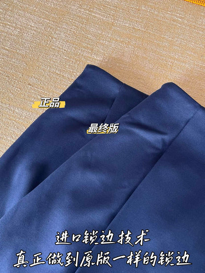 Timo / Miu Miu pleated compressed logo blue mini skirt