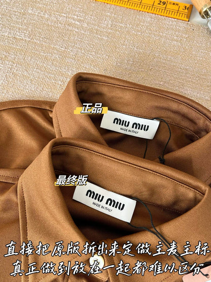 Timo / Miu Miu pleated compressed logo blue mini skirt